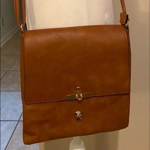 Taupe crossbody purse with back zipper